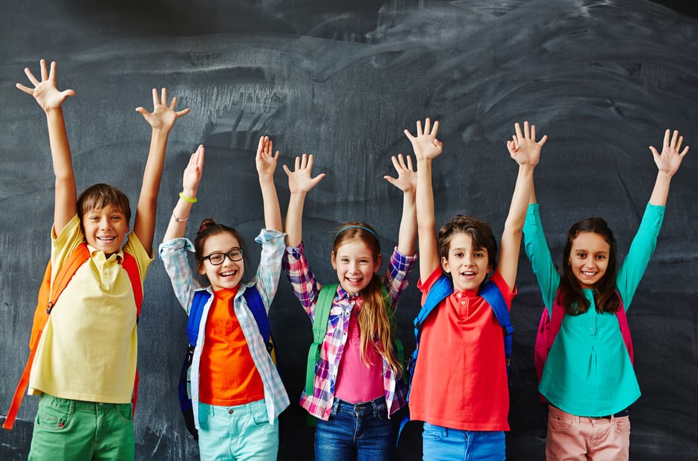 Happy children celebrating learning